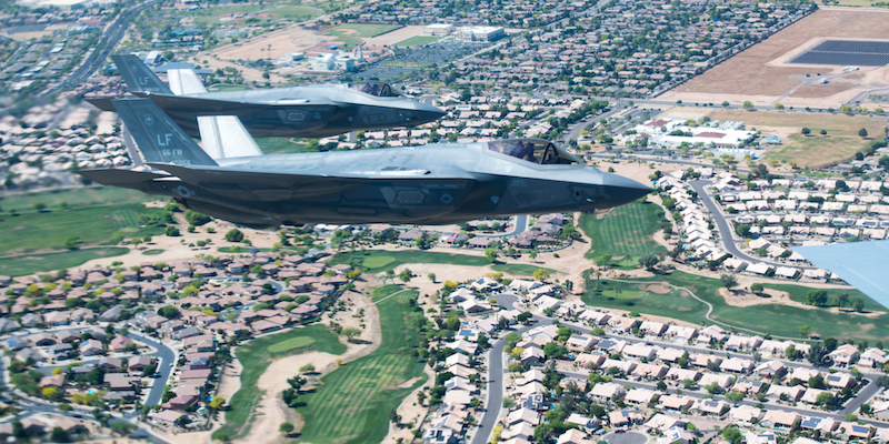 F-35A Lightning IIs piloted by Brig. Gen. Todd Canterbury, 56th Fighter Wing commander, and Col. Jim Greenwald, 944th FW commander, both assigned to Luke Air Force Base, fly in formation during the Air Force Salutes flyover May 1, 2020, over Arizona.The F-35s participated in a 15-aircraft formation including F-35s and F-16 Fightning Falcons from the 56th FW and 944th FWs, and a KC-135 from the 161st Air Refueling Wing as a Total Force salute to each American serving on the frontlines in the fight against Coronavirus Disease 2019. Air Force Salutes flyovers are a way for the U.S. Air Force to show appreciation to the thousands of heroes at the front line battling COVID-19. (U.S Air Force photo by Senior Airman Jacob Wongwai)